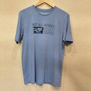 Travis Mathew Men's Light Blue Graphic Tee - "Not All Heroes Wear Capes"